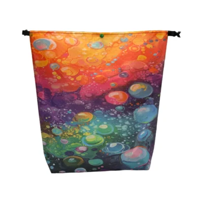 Colorful abstract bubble pattern on a hanging fabric banner.