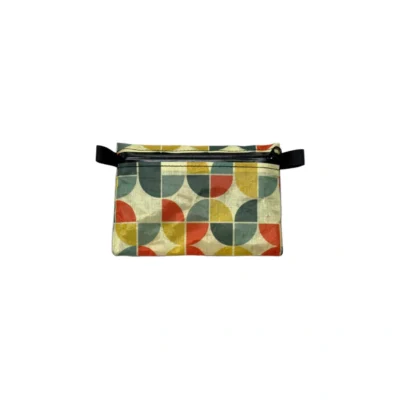 Rectangular fabric pouch with a multicolor semicircle pattern and a black top zipper.