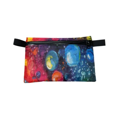 Colorful abstract print zippered fabric pouch with black zipper and side straps